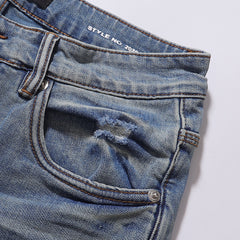 Purple‑Brand Light Wash Multi‑Ripped Patch Straight Jeans