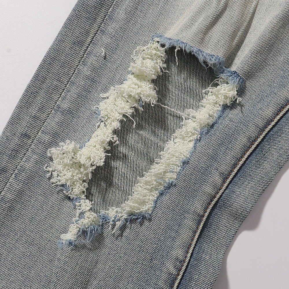 Purple‑Brand Light Faded Multi‑Frayed Ripped Straight Leg Jeans