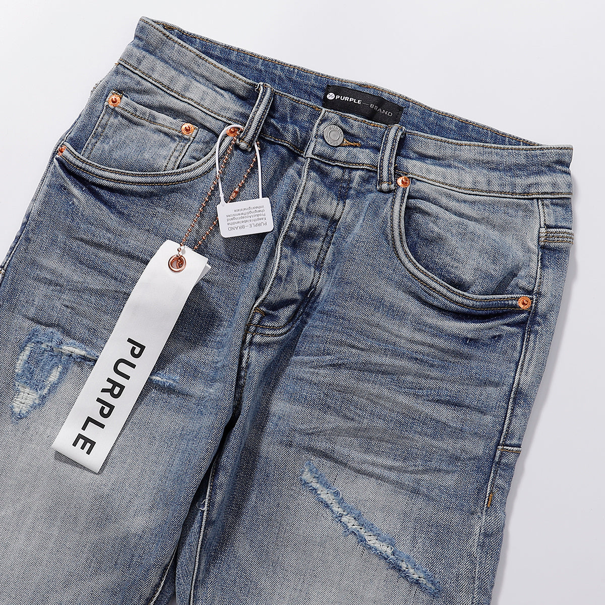 Purple‑Brand Light Blue Multi‑Patch Repair Distressed Straight Leg Jeans