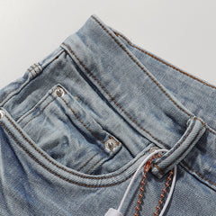 Purple‑Brand Light Blue Crinkle Wash Straight Leg Jeans